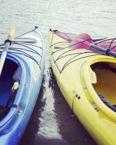 blue and yellow kayaks on tour with mom 