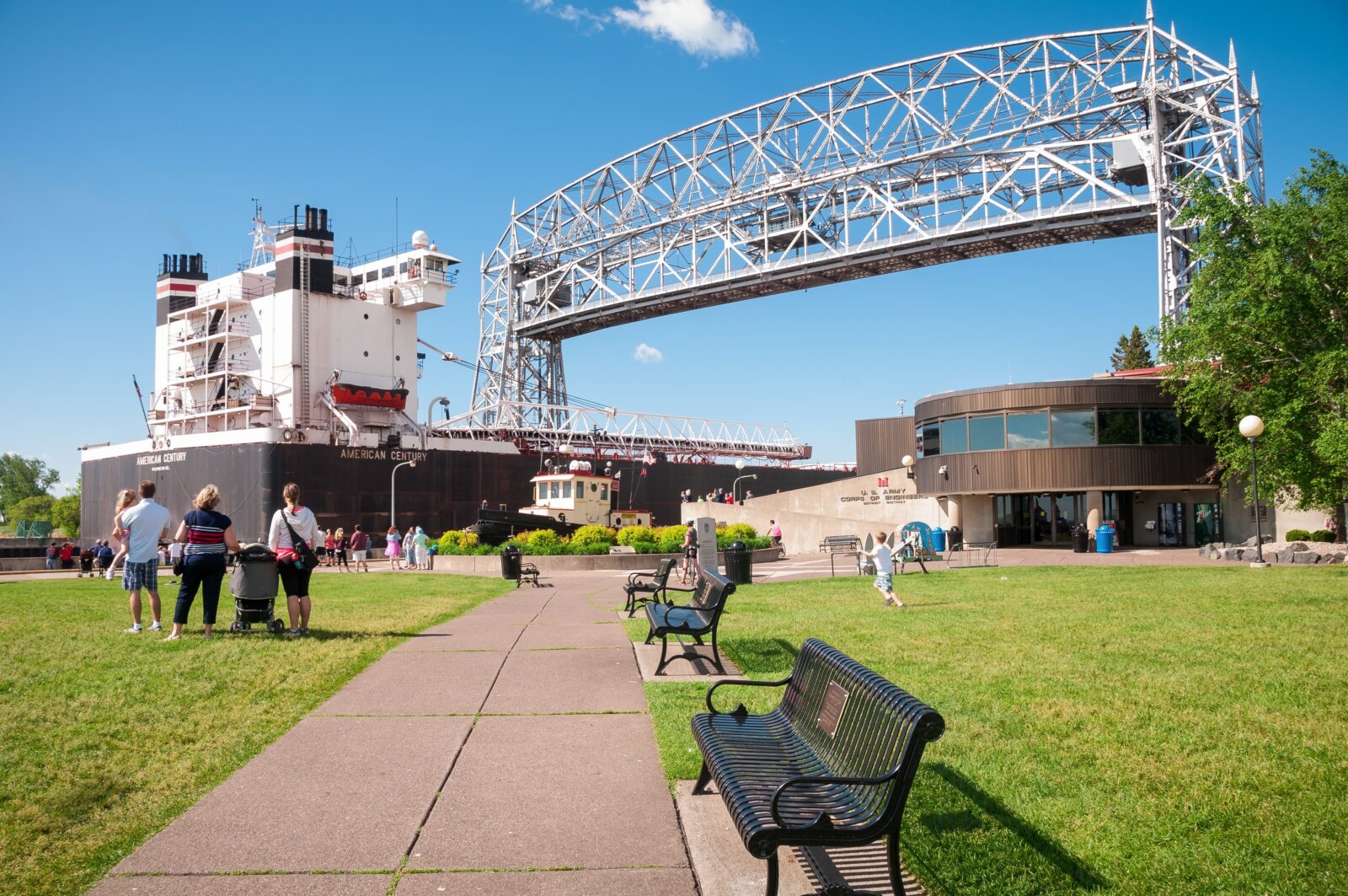 Great Lake shipping passes under Aerial Lift Bridge from Duluth Canal Park