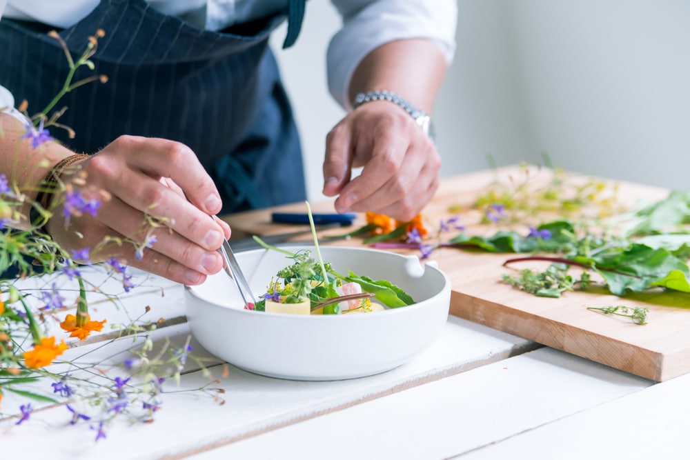 Canal Park Restaurants, photo of a chef putting together a beautiful dish 