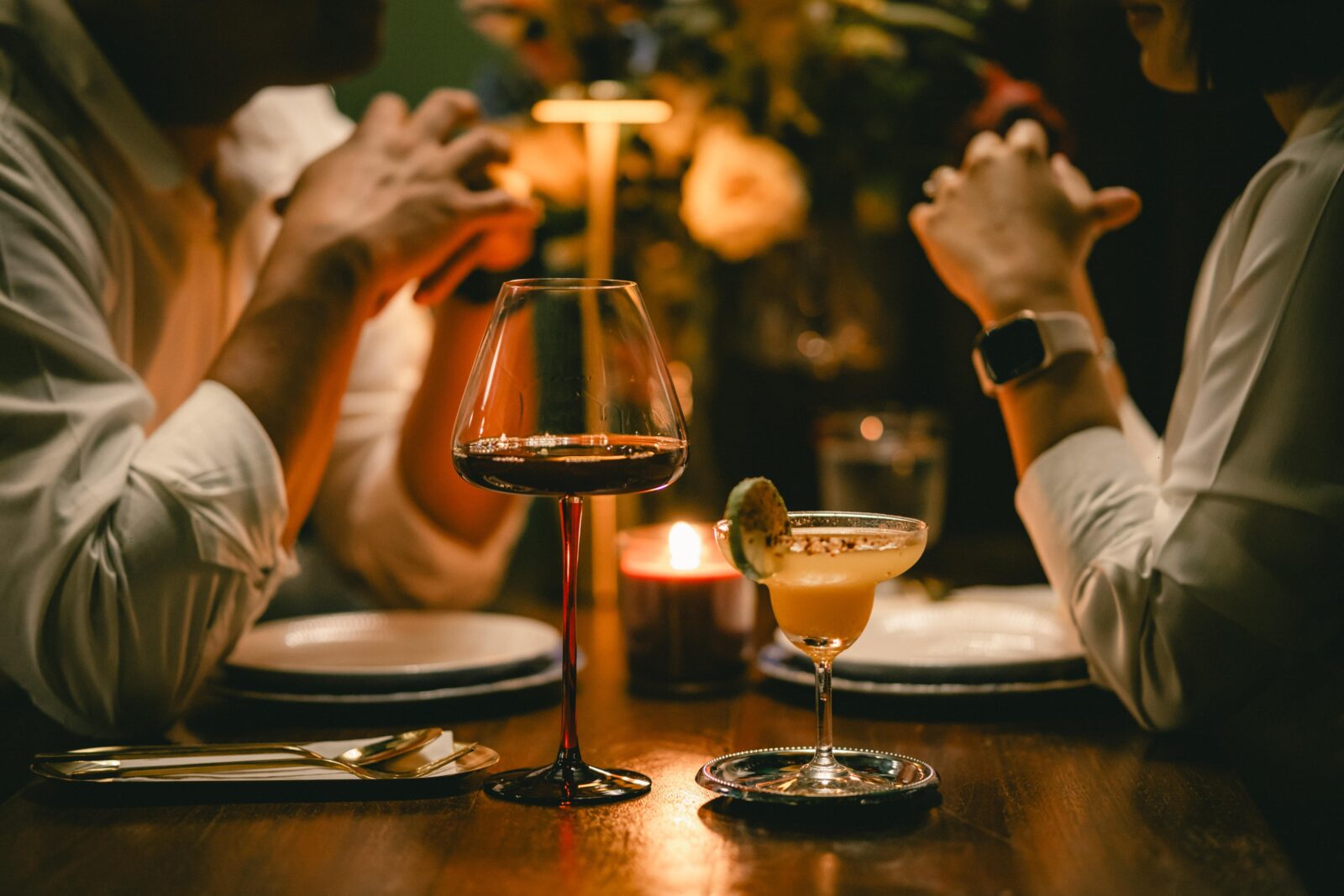 Valentine's Day Getaway on the North Shore 1 Couple sitting at table in romantic restaurant on Valentine's Day getaway in Duluth.